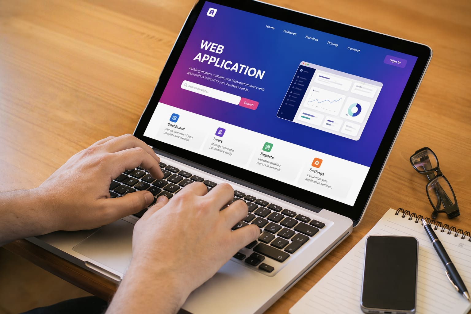 A developer working on a web application interface on a laptop at a desk, representing a web app development company in India