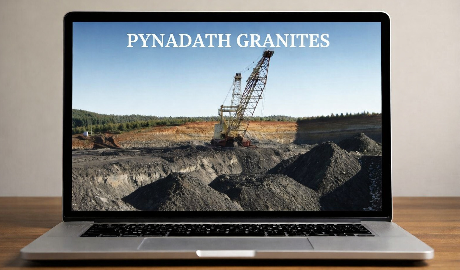 Granite quarry with heavy excavation machinery representing Pynadath Granites
